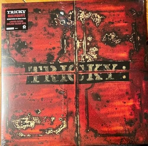 Red vinyl record of Tricky’s “Maxinquaye” with abstract, textured cover art.