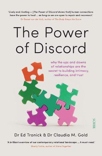 Book cover with colorful puzzle pieces and bold title: “The Power of Discord.”