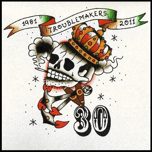 Troublemakers" CD cover: skull with crown, anchor, and ribbon with dates 1981-2011.