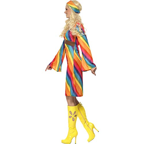 Woman in a colorful rainbow striped 70s style hippie costume.