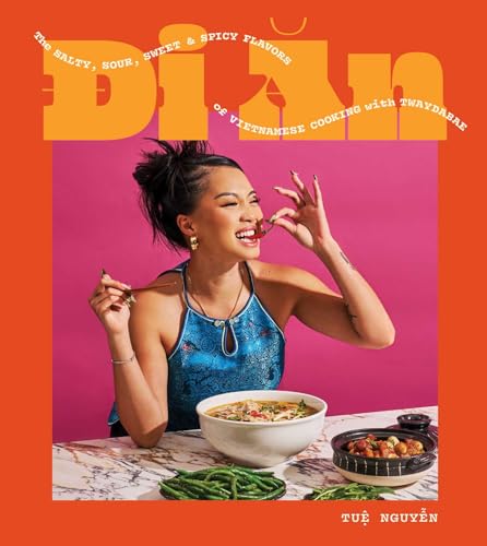 Cookbook cover featuring a woman with Vietnamese food, bright colors.