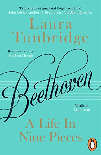 Book cover with teal background, black cursive text, and gold lettering for the title.