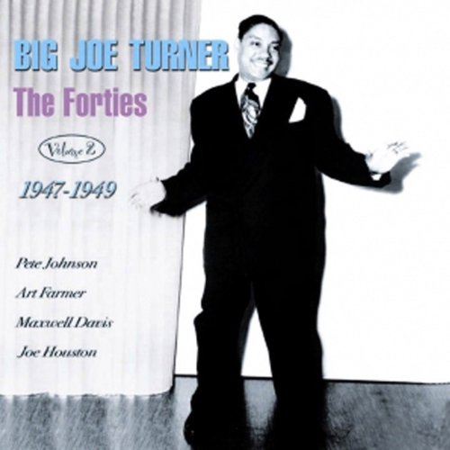 Big Joe Turner album cover, portrait of a smiling man in a suit.