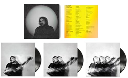Jeff Tweedy album cover and vinyl records in grayscale.