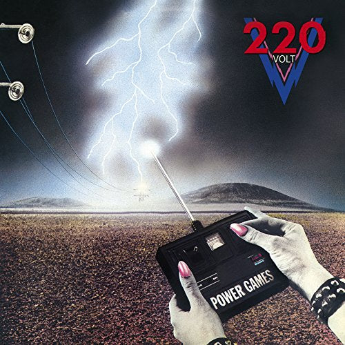 Hands holding a remote control directing lightning in a desert landscape.