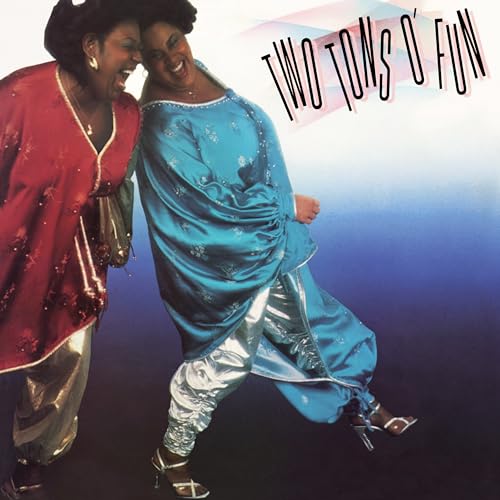 Album cover featuring two Black women in colorful, shimmering outfits.