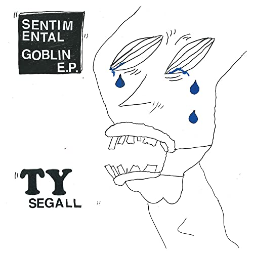 Black and white drawing of a crying face with "Ty Segall" text.
