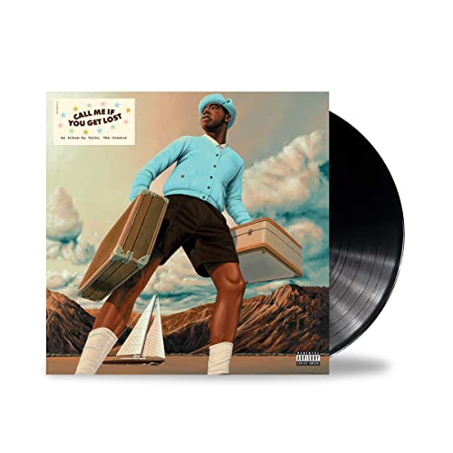 Tyler, The Creator album cover with vinyl record beside it.