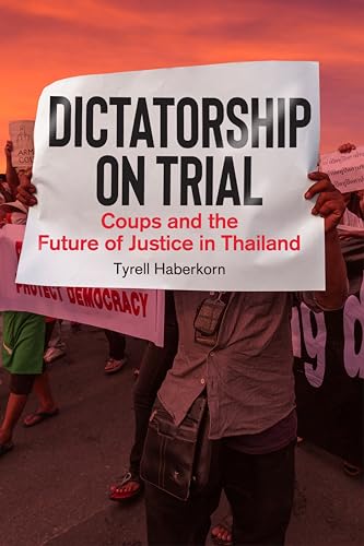 Book cover showing a person holding a sign titled Dictatorship on Trial.