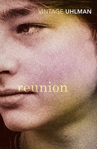 Book cover: close-up of a person’s face with the title “reunion”.