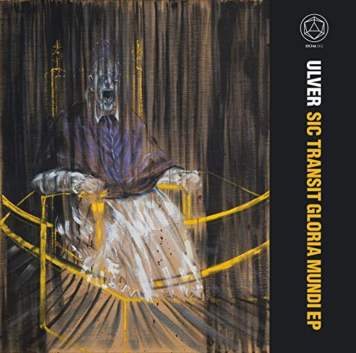 CD cover: dark, painted figure in a chair with gold accents.