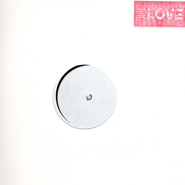 Vinyl record with a central label and red "LOVE" text above.