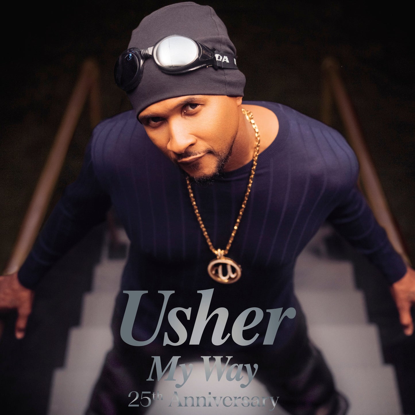 Usher in a blue outfit and goggles, album title “My Way” visible.
