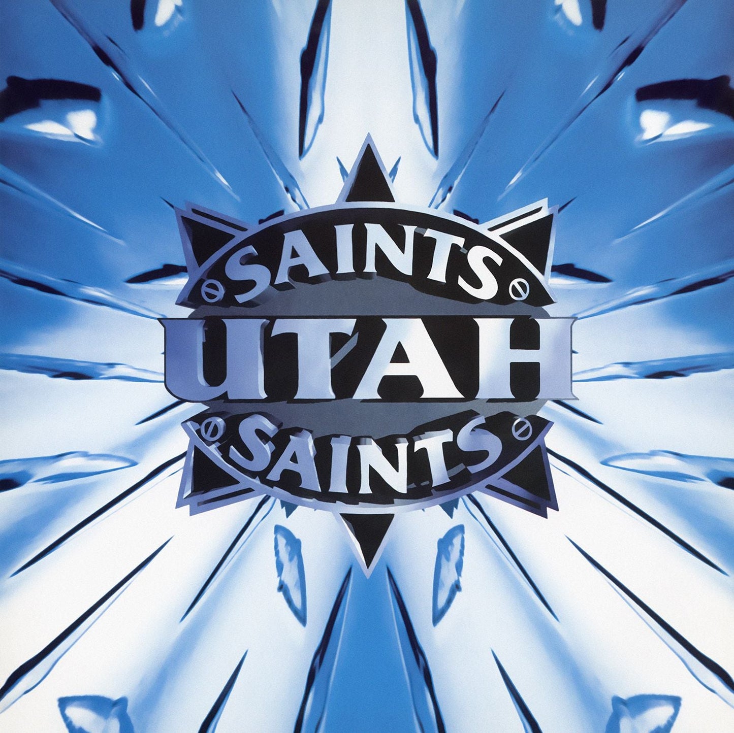 Album cover for Utah Saints, featuring blue radial burst and text.