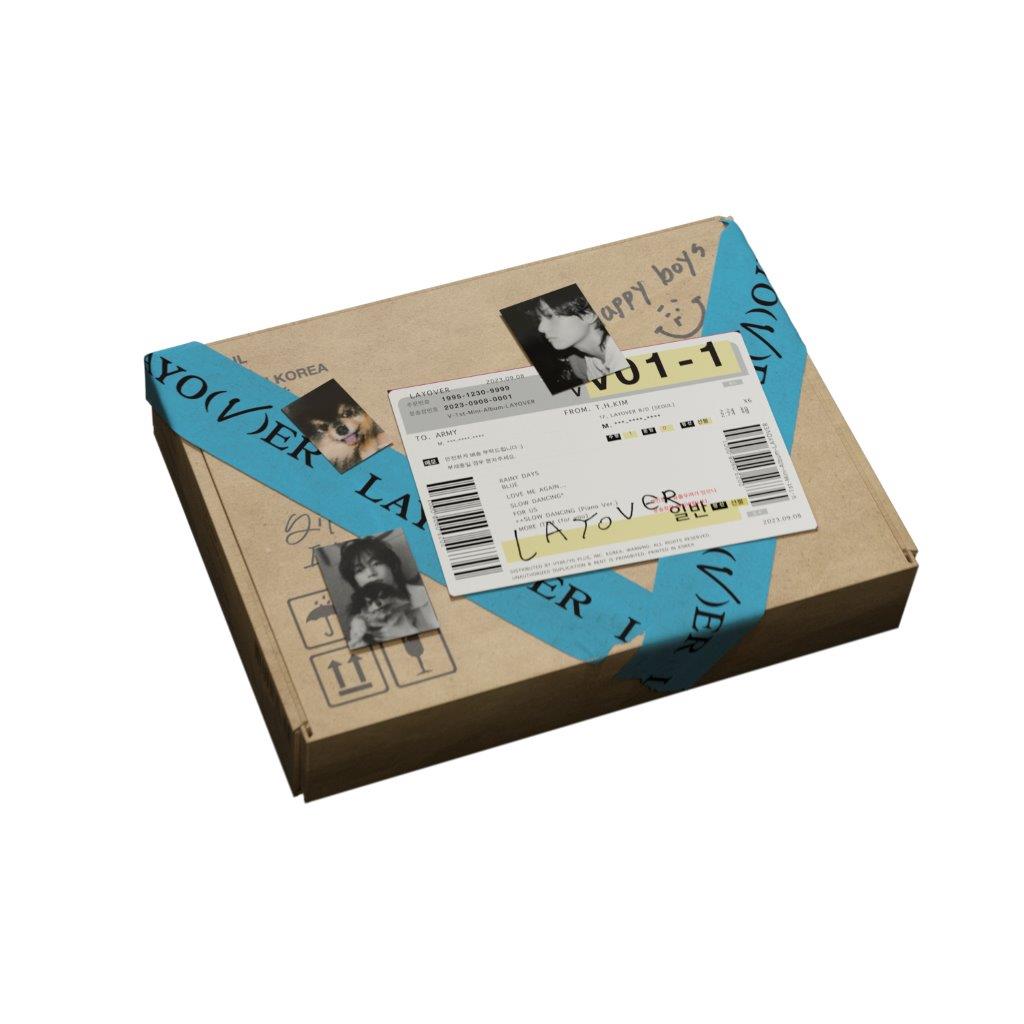 Brown cardboard box with blue tape and a barcode sticker.