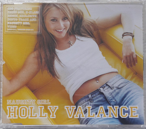 CD case for Holly Valance’s “Naughty Girl” featuring her portrait.