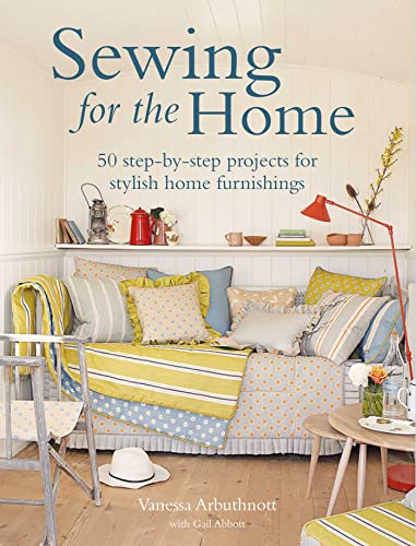 Book cover showing a daybed with patterned pillows and throws in a bright room.