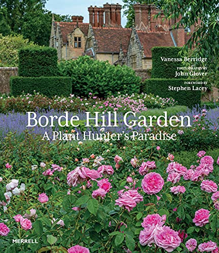 Book cover featuring a stately home surrounded by lush pink and purple flowers.