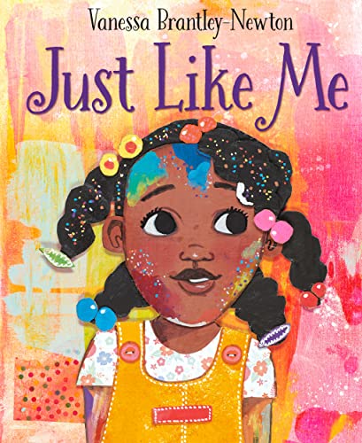 Book cover: “Just Like Me” features a young Black girl with braids.