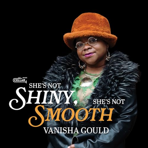 Vanisha Gould album cover: woman in orange hat and black coat.