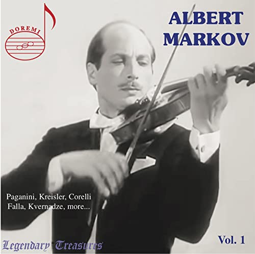 Black and white photo of Albert Markov playing the violin in a tuxedo.