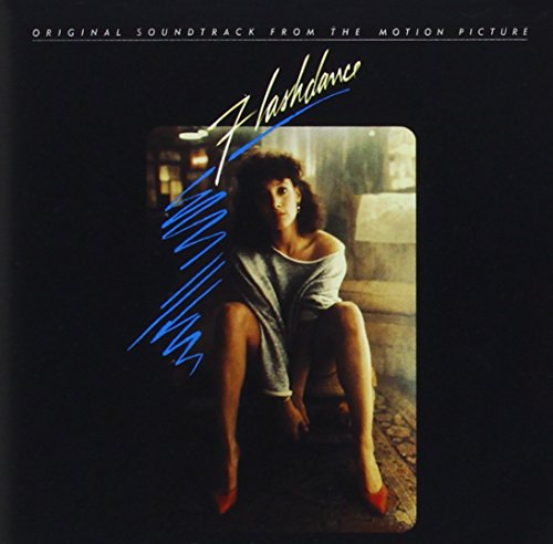 Flashdance soundtrack album cover featuring a woman in a grey sweater on black background.