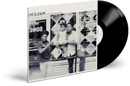 Vinyl record album cover featuring a black and white photo of two men and child.