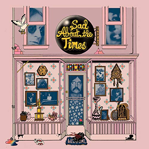 CD cover: illustrated building facade with portraits and objects inside.