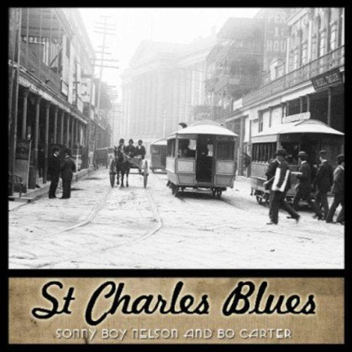 Vintage street scene with trolley car and album title "St. Charles Blues".