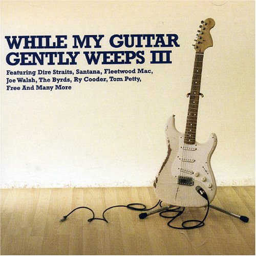 CD cover: white guitar leaning against a wall, text reads "While My Guitar Gently Weeps III".