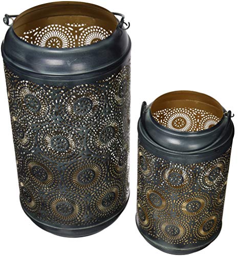 Two ornate, dark metal lanterns with cut-out floral patterns.