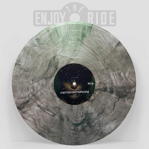 Swirled grey and green vinyl record with a starry night label center.