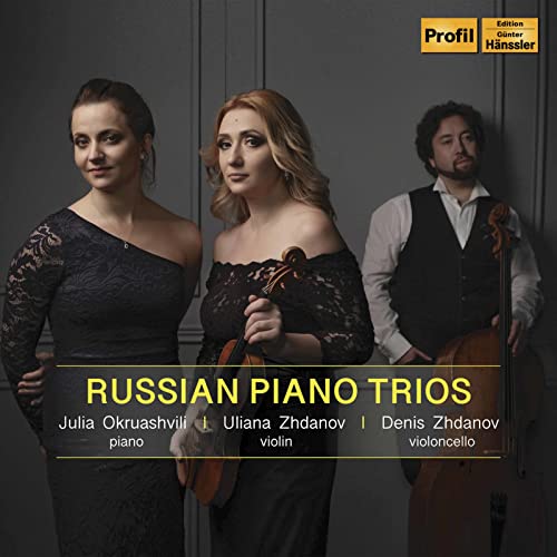 CD cover featuring three musicians with piano, violin, and cello.