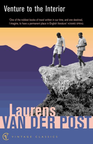 Book cover: two men on a rocky outcrop with mountains in background.
