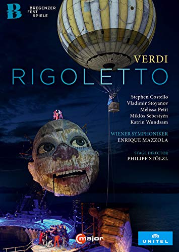 DVD cover for Verdi’s Rigoletto opera, featuring a large sculpted face.