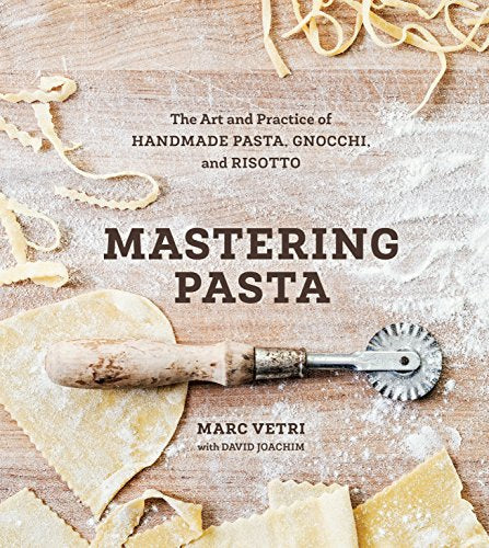 Cookbook cover titled Mastering Pasta with a pastry wheel, flour, and fresh pasta dough.