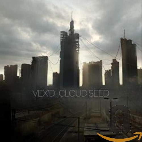 Dark cityscape album cover for Vexd’s “Cloud Seed” with text overlay.