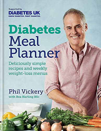 "Book cover featuring a smiling man preparing vegetables with title 'Diabetes Meal Planner'."