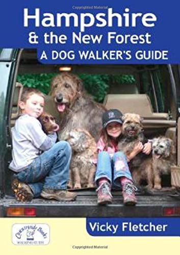 Book cover: "Hampshire & The New Forest" dog walking guide with people and dogs.
