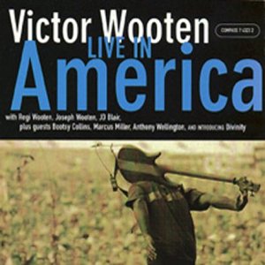 CD cover for Victor Wooten Live In America featuring a musician carrying a bass guitar.