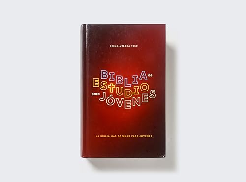Red hardback Spanish study Bible with title in gold lettering.