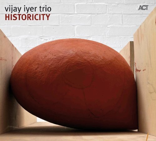 “Historicity” CD cover featuring a large, reddish-brown oval shape.