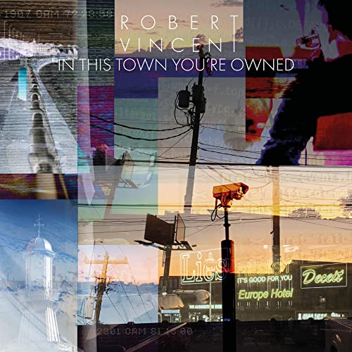 CD cover for "In This Town You're Owned" with urban imagery.