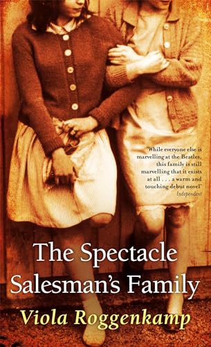 Book cover: two girls in vintage clothing, text reads "The Spectacle Salesman's Family".