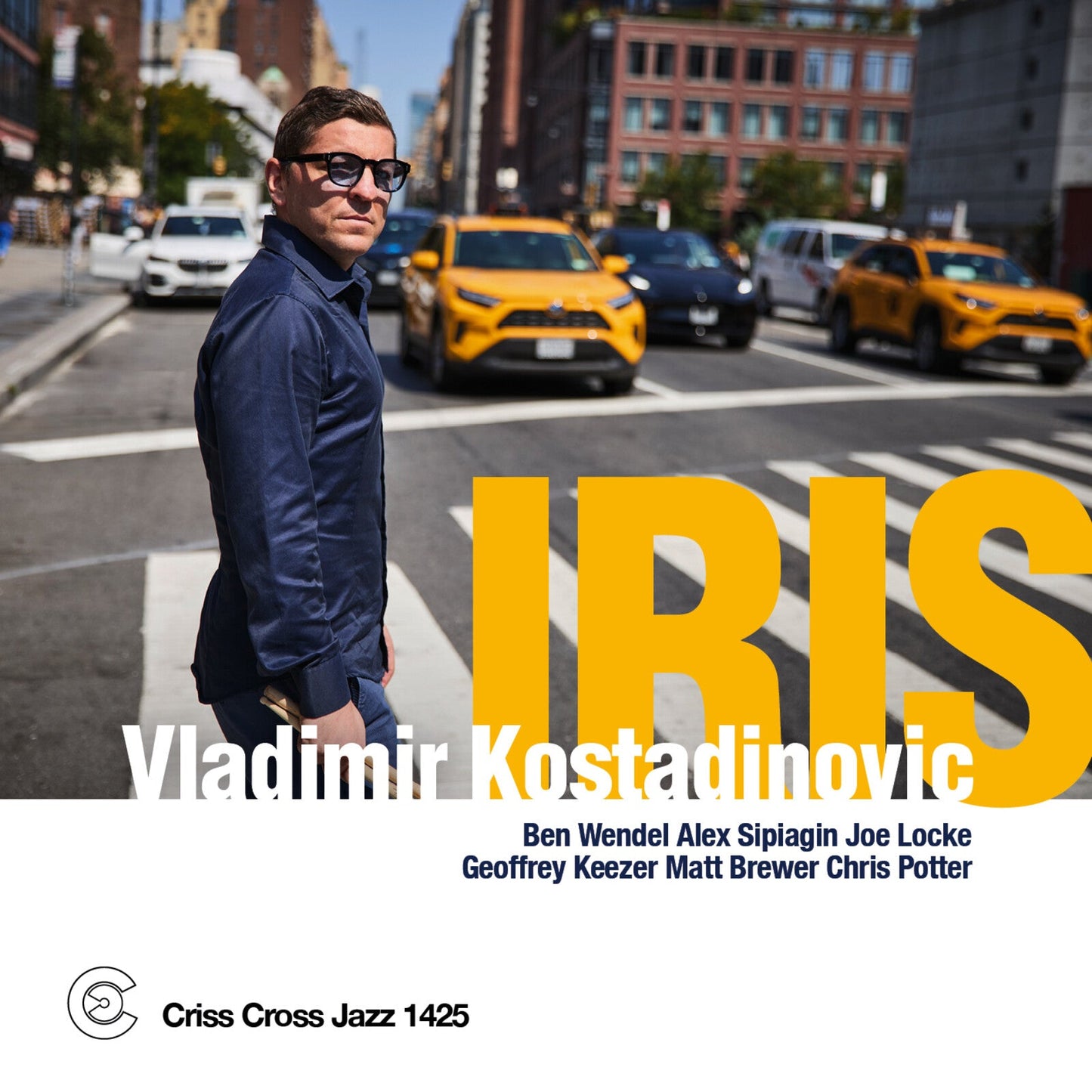 CDBSCD cover featuring Vladimir Kostadinovic in a city street with yellow taxis.
