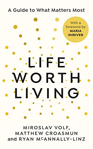 Book cover with gold polka dots and bold title "LIFE WORTH LIVING".