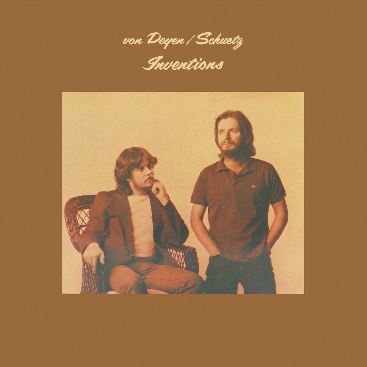 Album cover featuring two men on a brown background with the title Inventions.