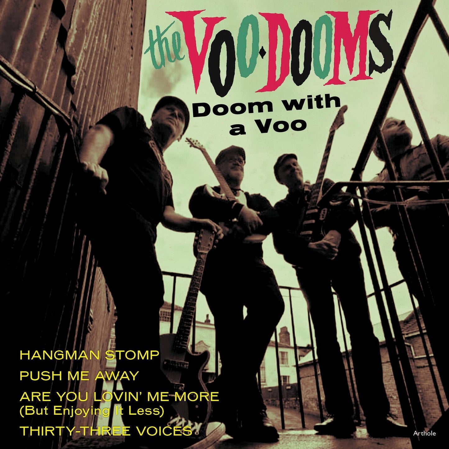 Record cover for "The Voo-Dooms" featuring a band on a rooftop.