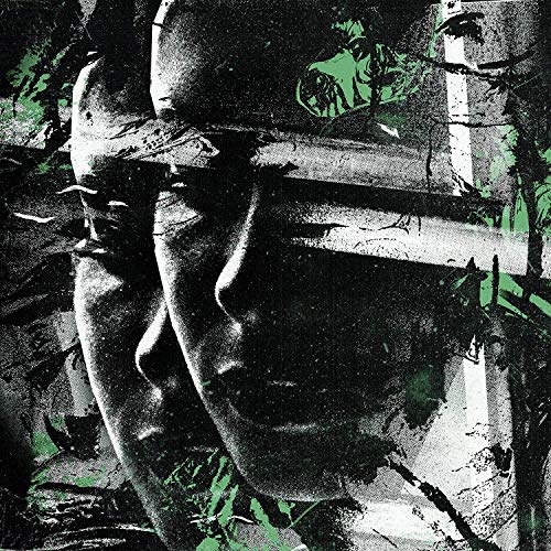 Close-up of a person’s face with green and black textured overlay.