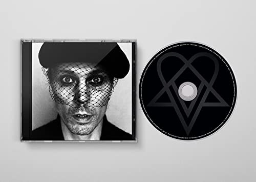 Black and white CD case and disc featuring a veiled face.
